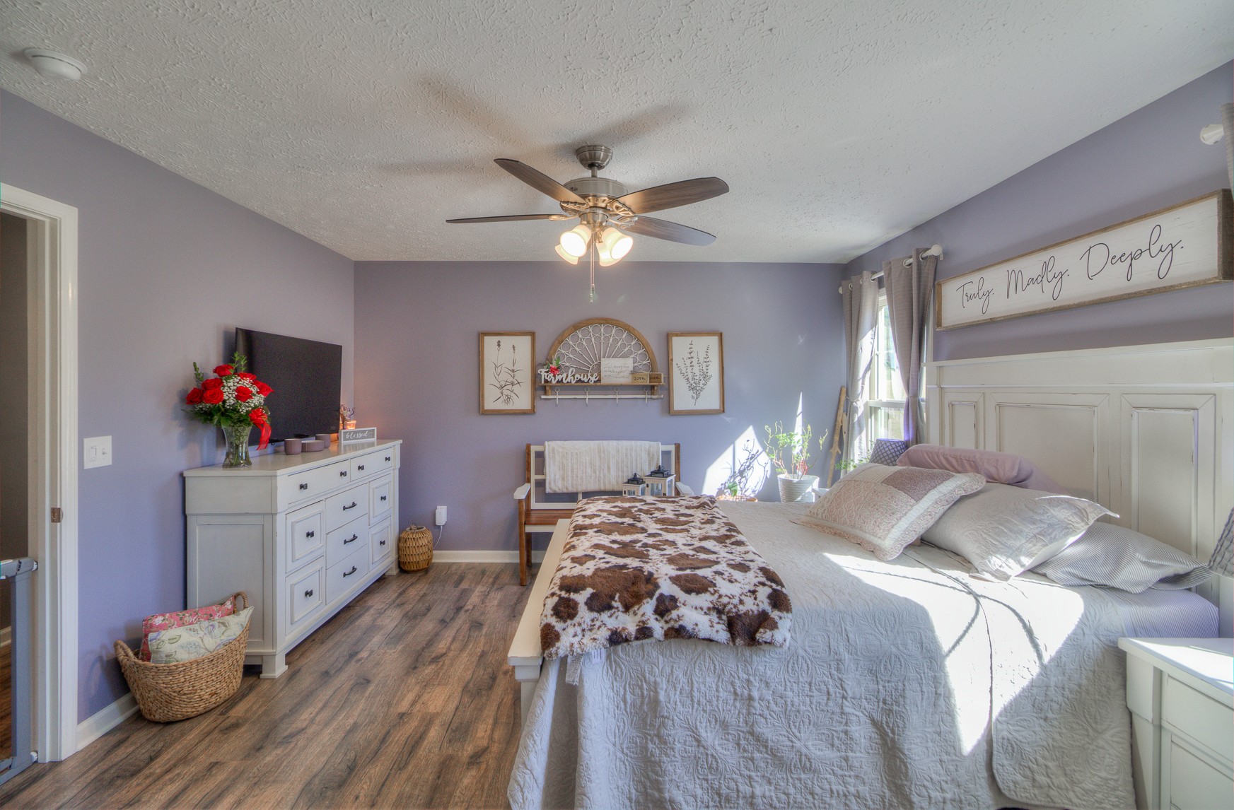 869 Jarrell Road Manchester, TN 37355 - Photo 12 of 33 a bedroom with a bed and a dresser with mirror
