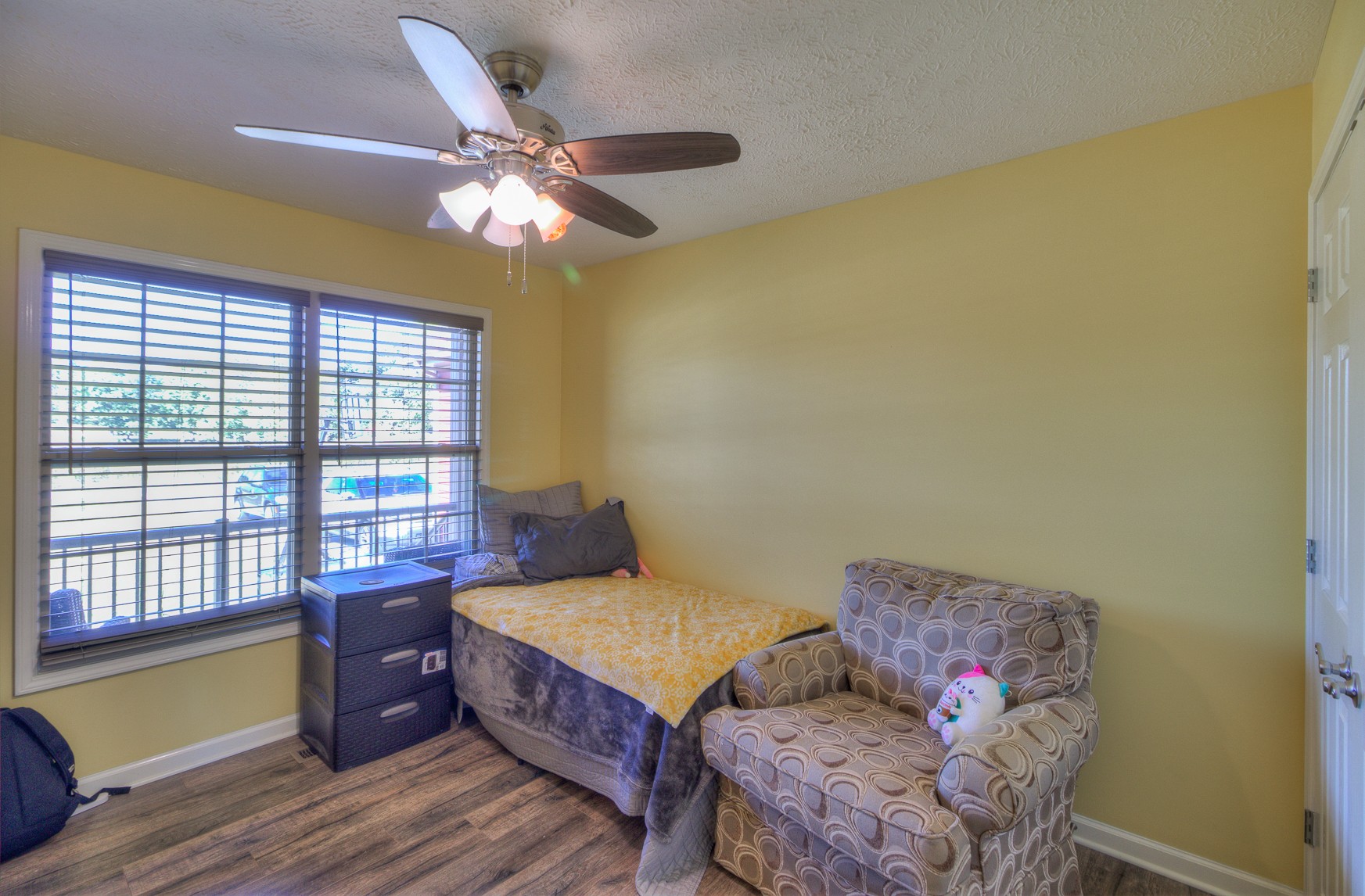 869 Jarrell Road Manchester, TN 37355 - Photo 16 of 33 a bedroom with a bed and wooden floor