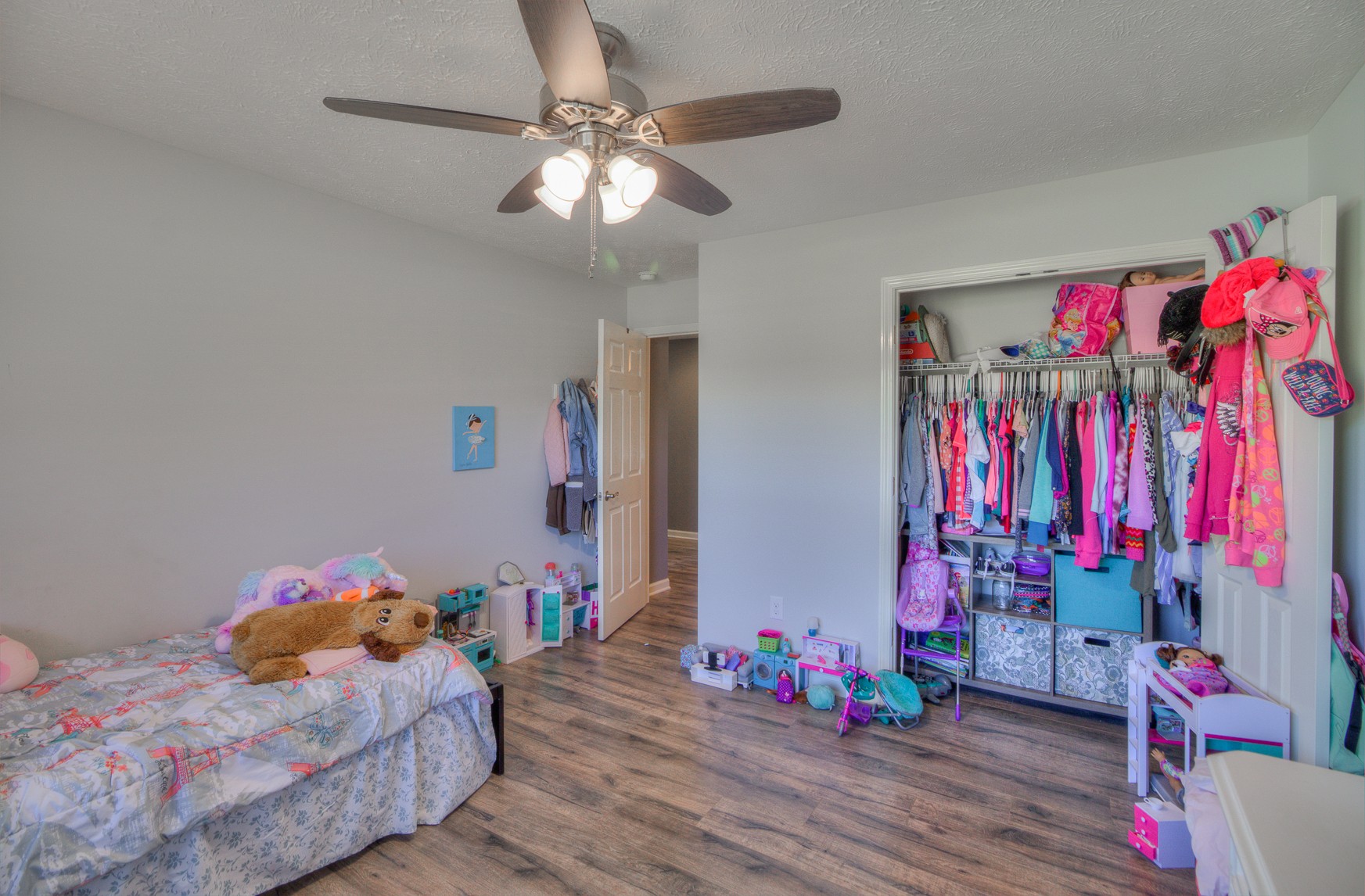 869 Jarrell Road Manchester, TN 37355 - Photo 19 of 33 a bedroom with bed and a chandelier