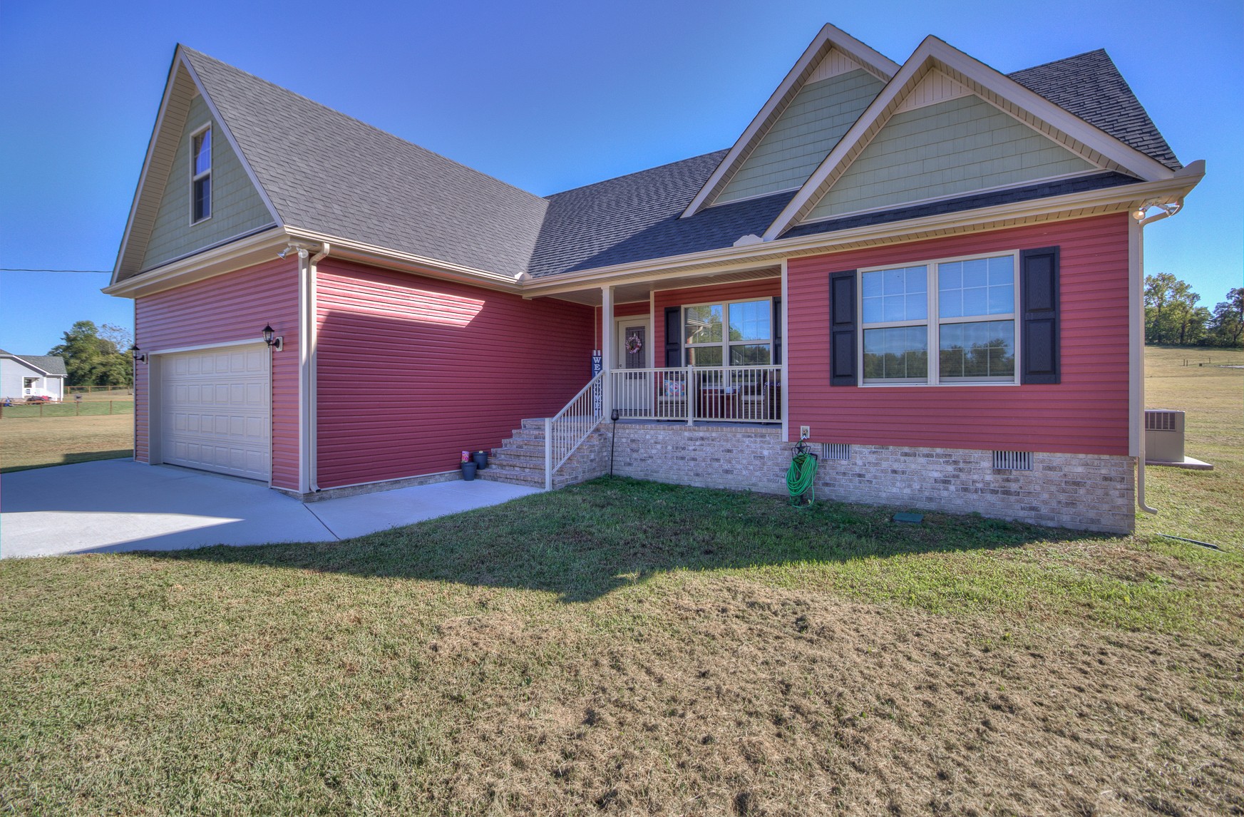 869 Jarrell Road Manchester, TN 37355 - Photo 2 of 33 a front view of a house with a yard