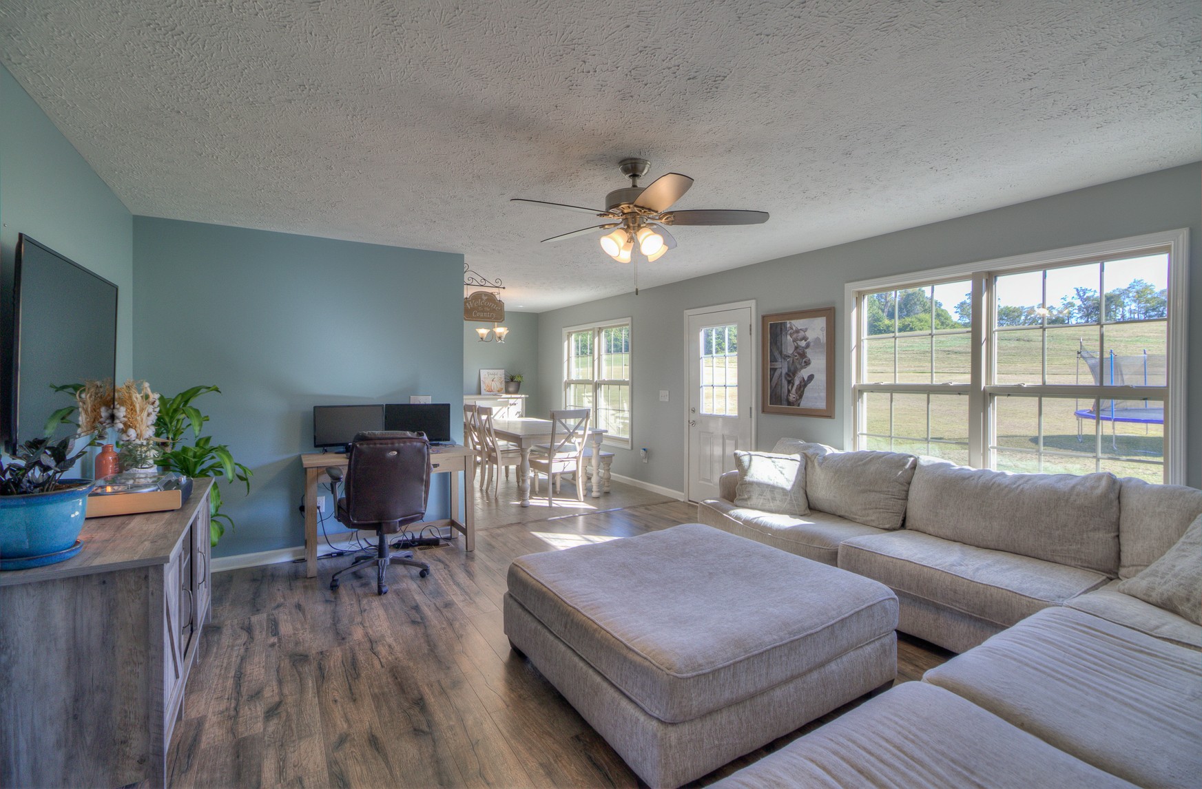 869 Jarrell Road Manchester, TN 37355 - Photo 5 of 33 a living room with furniture a wooden floor and a window