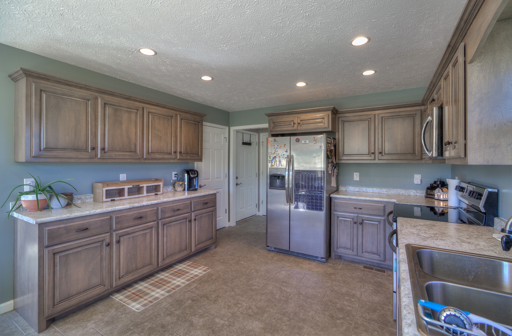 869 Jarrell Road Manchester, TN 37355 - Photo 9 of 33 a kitchen with stainless steel appliances granite countertop a sink and cabinets