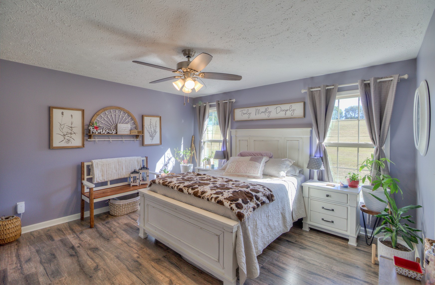 869 Jarrell Road Manchester, TN 37355 - Photo 10 of 33 a bedroom with a bed and a chandelier