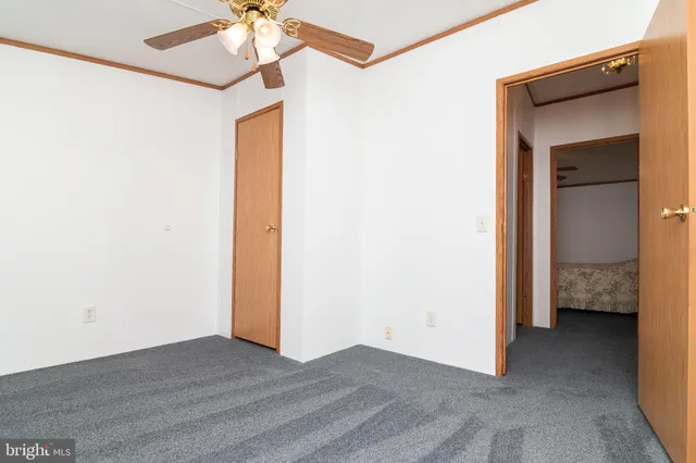 a view of an entryway with a chandelier