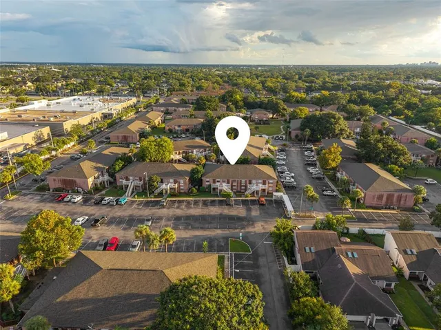 an aerial view of a city with ocean view
