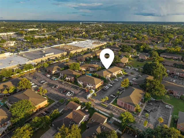 a aerial view of multi story residential apartment building