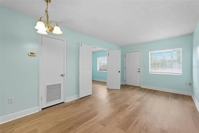 a kitchen with stainless steel appliances granite countertop a sink and cabinets