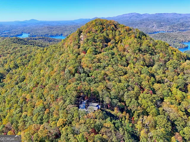 a view of an outdoor space and a mountain