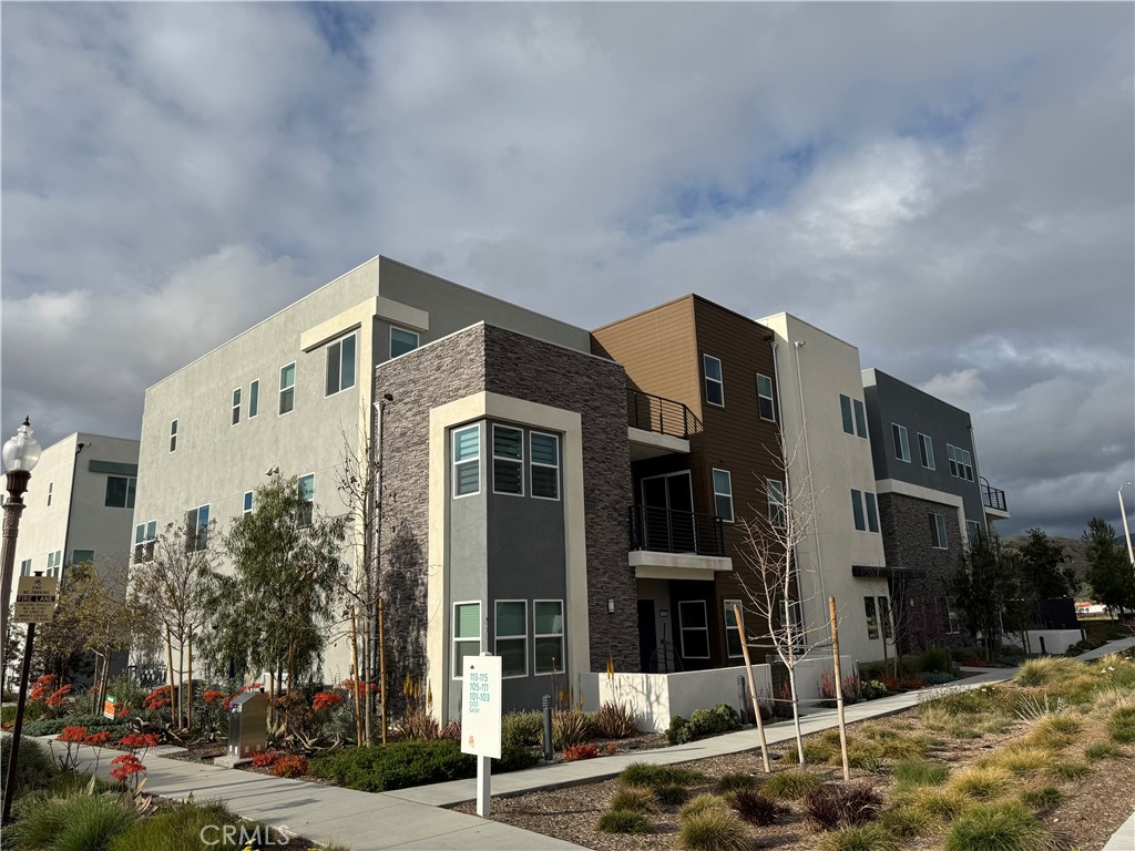 a front view of a building with street view