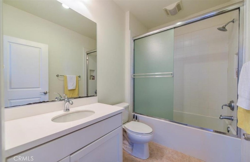 202 Kempton Irvine, CA 92620 - Photo 4 of 7 a bathroom with a sink a toilet and shower
