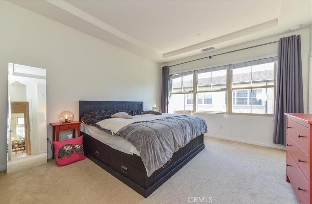 202 Kempton Irvine, CA 92620 - Photo 5 of 7 a spacious bedroom with a bed and window