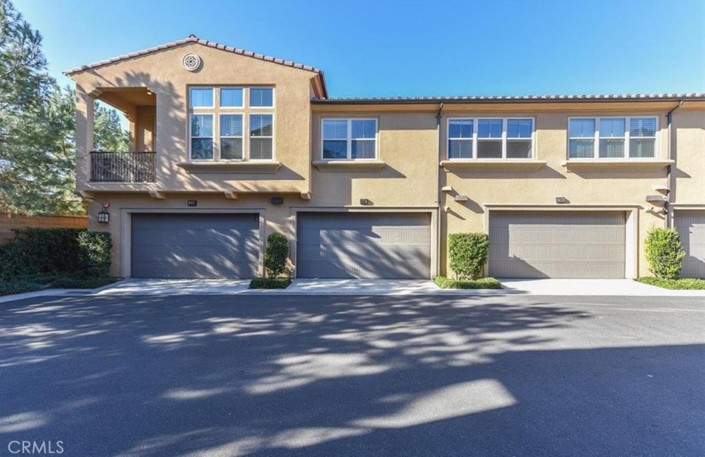 202 Kempton Irvine, CA 92620 - Photo 7 of 7 a front view of a house with a yard