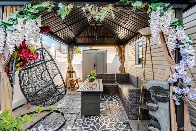 a view of living room filled with furniture