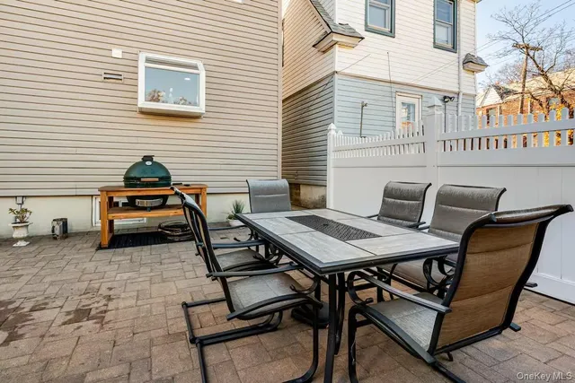 a car parked on the side of a brick building