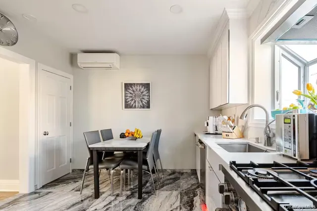 a workspace with furniture and window