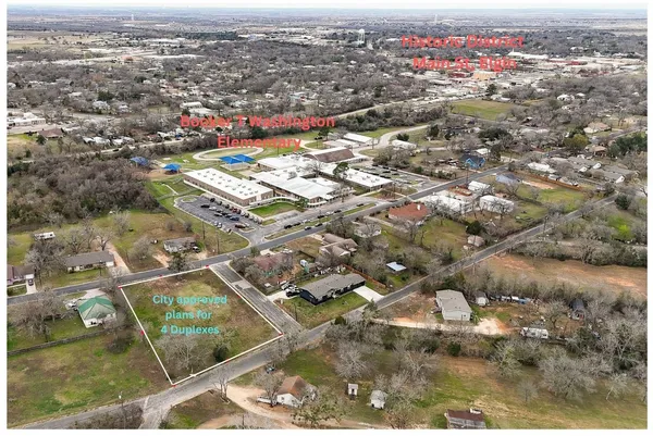 a view of swimming pool from a balcony