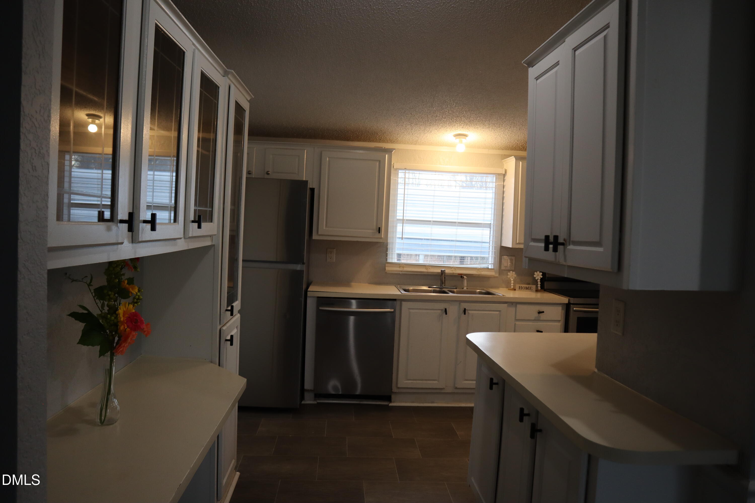 4762 Old Allensville Road Roxboro, NC 27574 - Photo 13 of 33 a kitchen with a sink appliances and cabinets