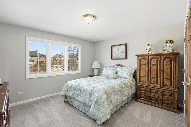 a bedroom with a bed and a closet