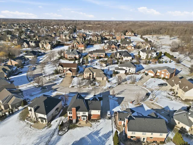 an aerial view of a city with lots of residential buildings