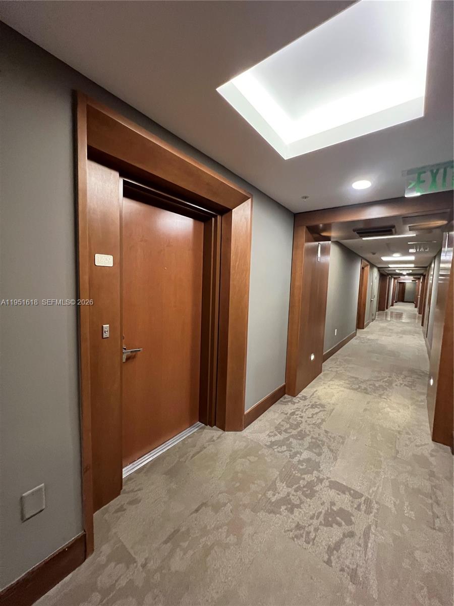 31 Southeast 5th Street, Unit 1409 Miami, FL 33131 - Photo 12 of 16 a view of hallway with an empty room