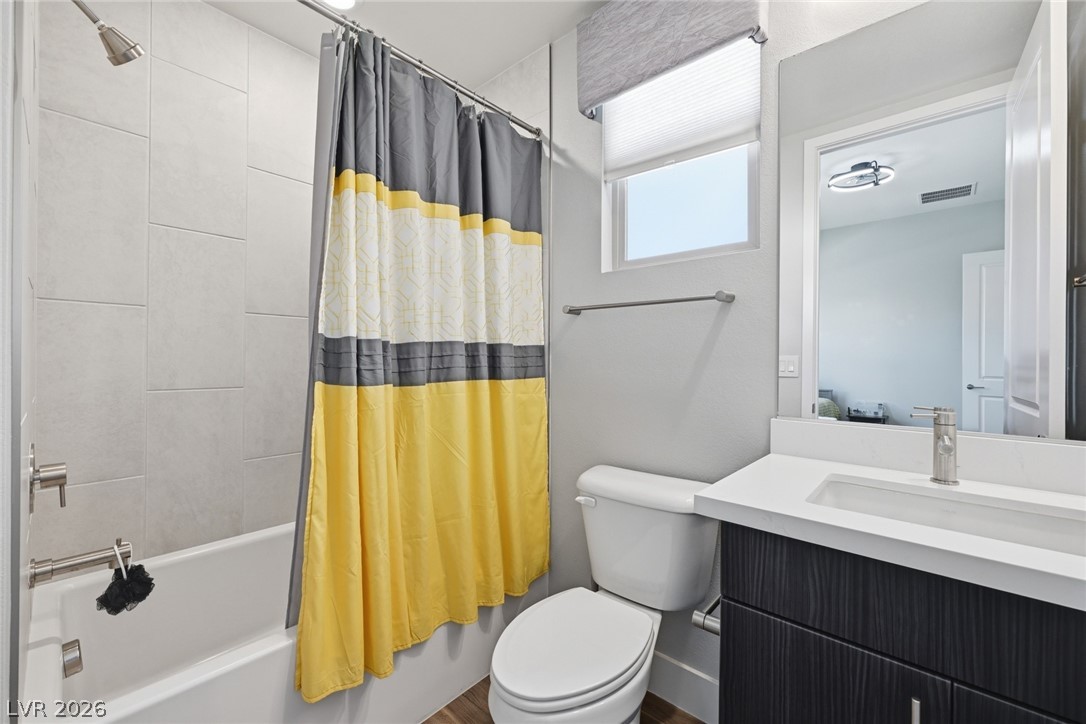 4246 Swift Street Las Vegas, NV 89135 - Photo 44 of 71 Bathroom with vanity and shower / tub combo with curtain