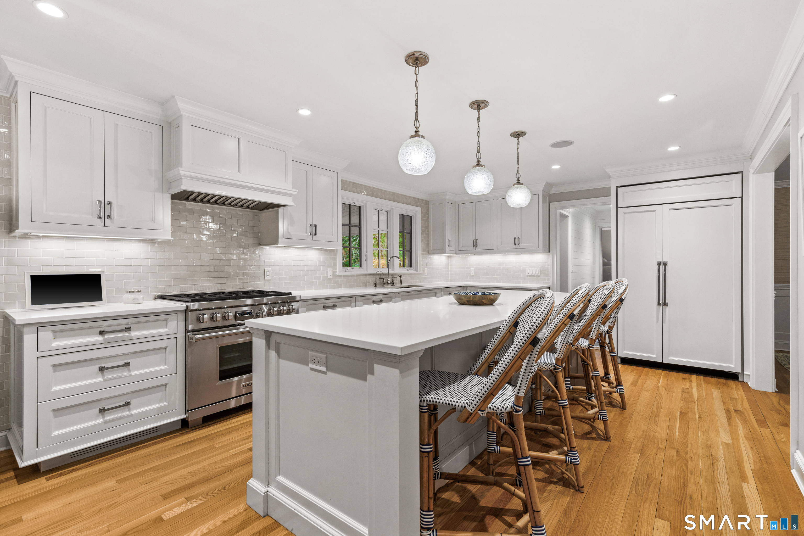 599 North Wilton Road New Canaan, CT 06840 - Photo 11 of 37 Renovated kitchen w/ large island