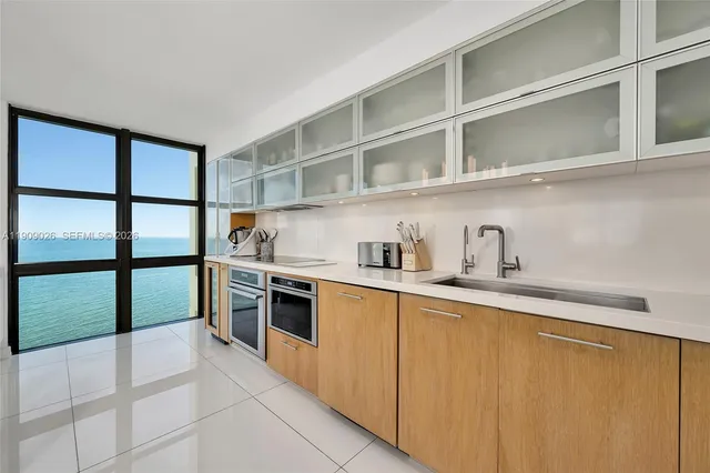 a kitchen with a stove and a microwave
