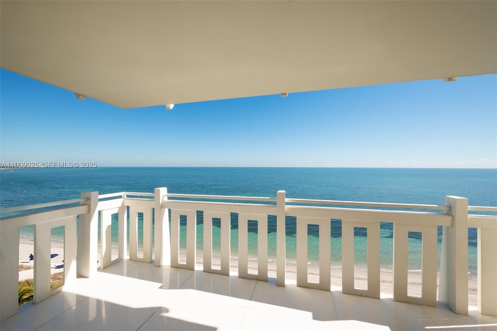 1111 Crandon Boulevard, Unit A801 Key Biscayne, FL 33149 - Photo 2 of 29 a view of wooden floor and a balcony