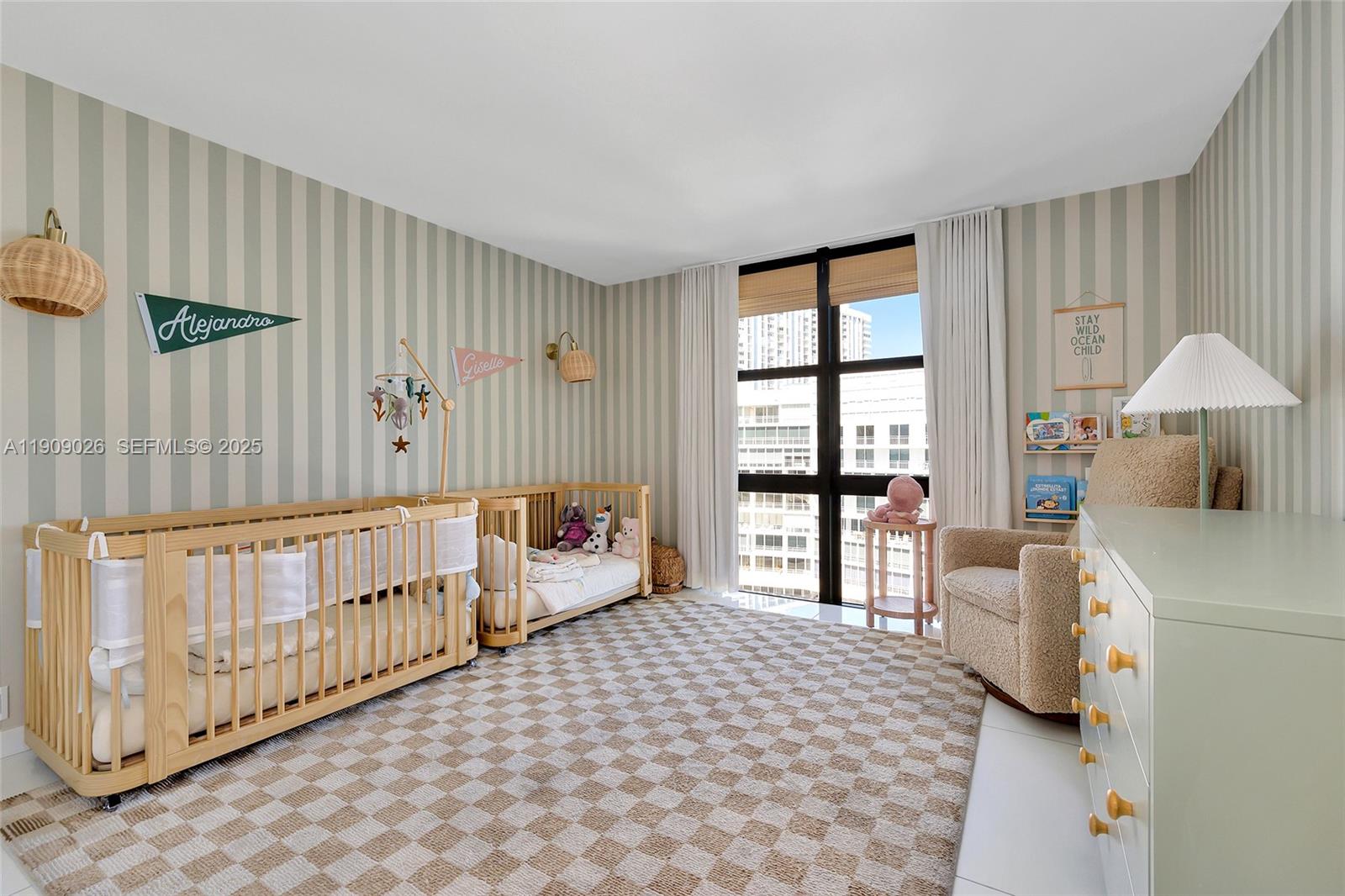 1111 Crandon Boulevard, Unit A801 Key Biscayne, FL 33149 - Photo 21 of 29 a bedroom with furniture and a window