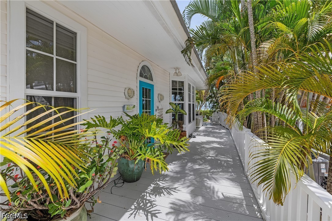 515 Useppa Useppa Island Bokeelia, FL 33922 - Photo 38 of 43 a view of a house with a yard