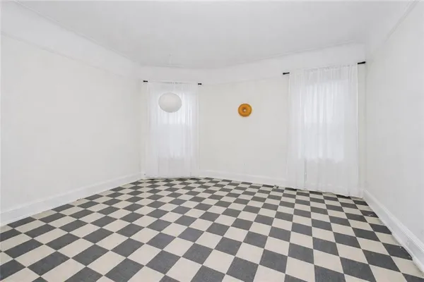 a view of a black and white checkered floor