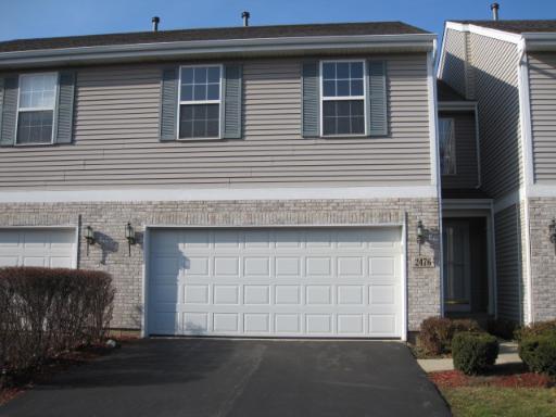 2476 Amber Lane, Unit 2476 Elgin, IL 60123 - Photo 1 of 1 a view of a house with a garage
