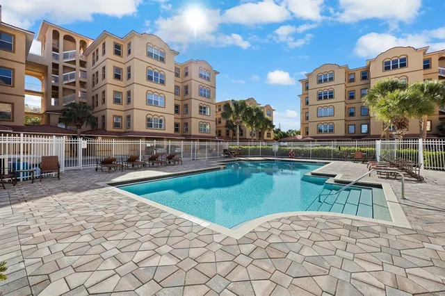 a view of a swimming pool and outdoor space