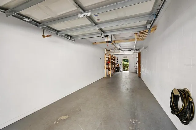 a view of a hallway with staircase