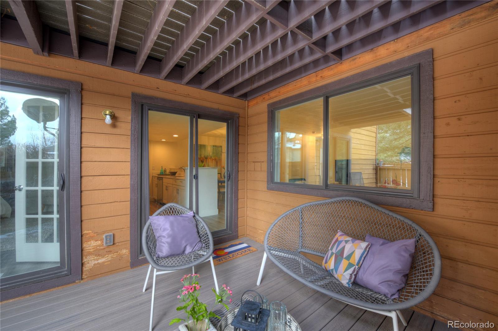 6240 Willow Lane Boulder, CO 80301 - Photo 14 of 25 a living room with furniture and wooden floor