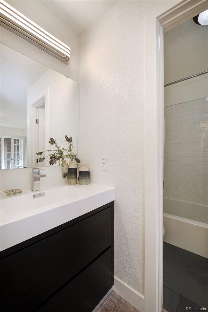 6240 Willow Lane Boulder, CO 80301 - Photo 16 of 25 a bathroom with a sink vanity and a mirror