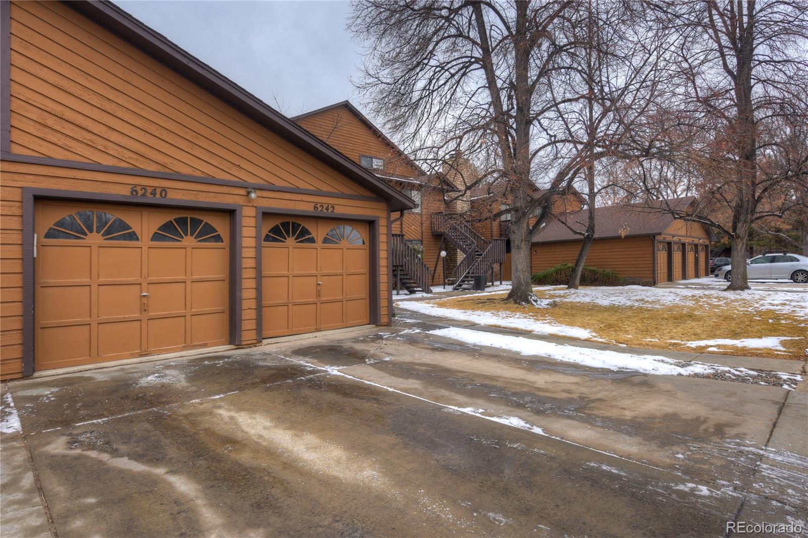 6240 Willow Lane Boulder, CO 80301 - Photo 25 of 25 a view of a house with a snow in the yard