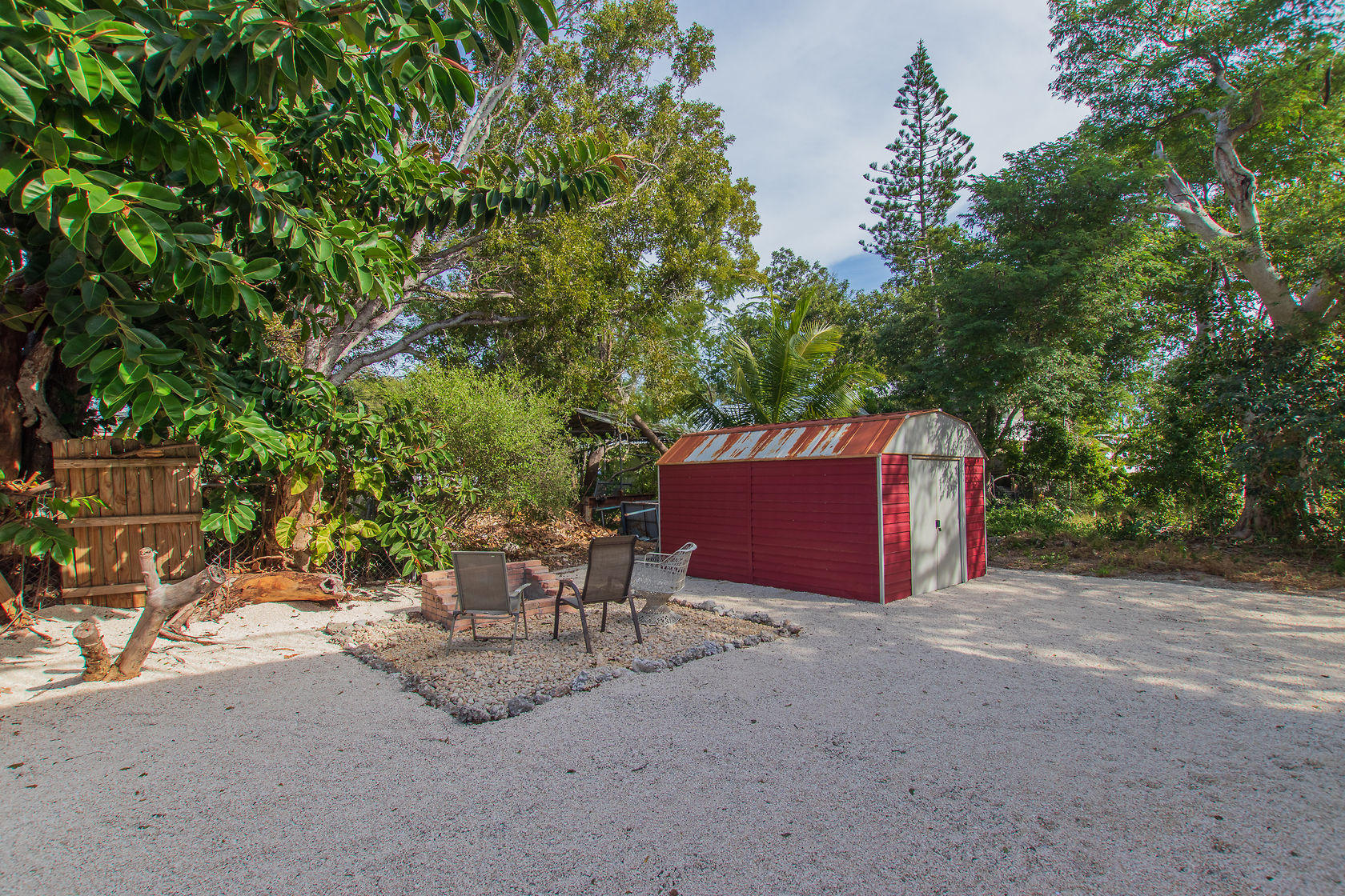 527 Plante Street Key Largo, FL 33037 - Photo 31 of 39 Fire Pit and Shed