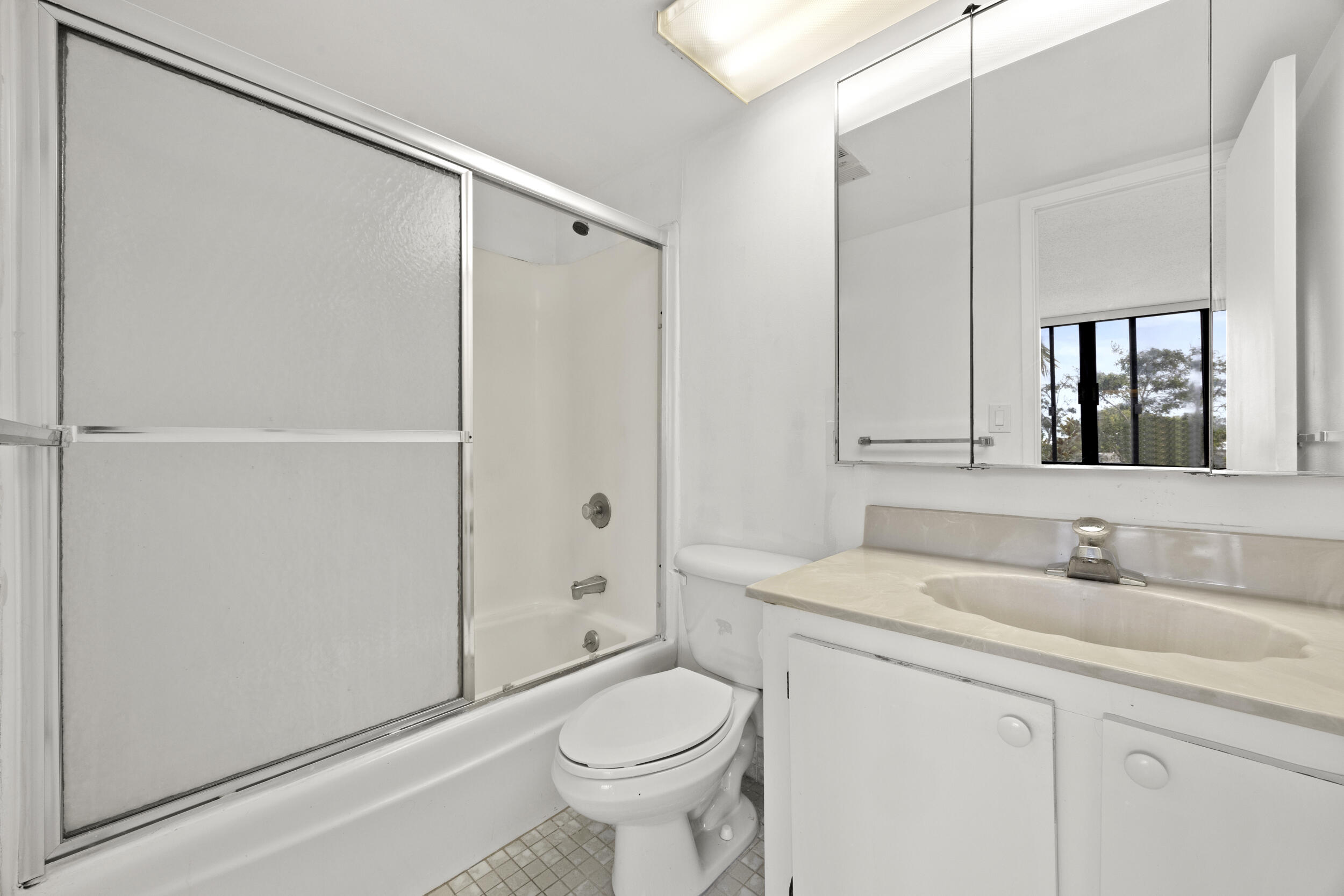 1401 South Federal Highway, Unit 220 Boca Raton, FL 33432 - Photo 21 of 27 a bathroom with a sink toilet and shower