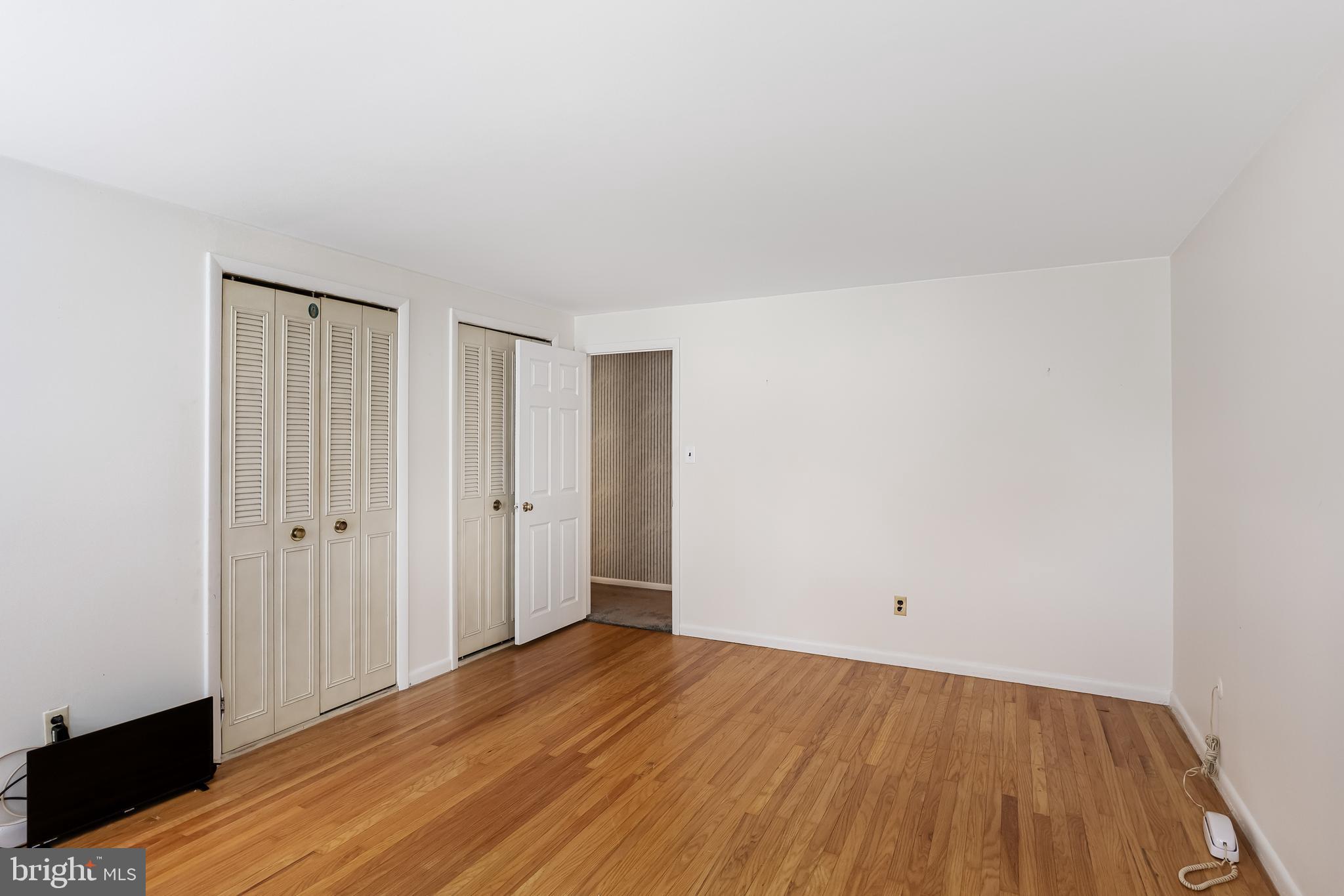 28 Elmgate Road Marlton, NJ 08053 - Photo 18 of 25 a view of an empty room with wooden floor