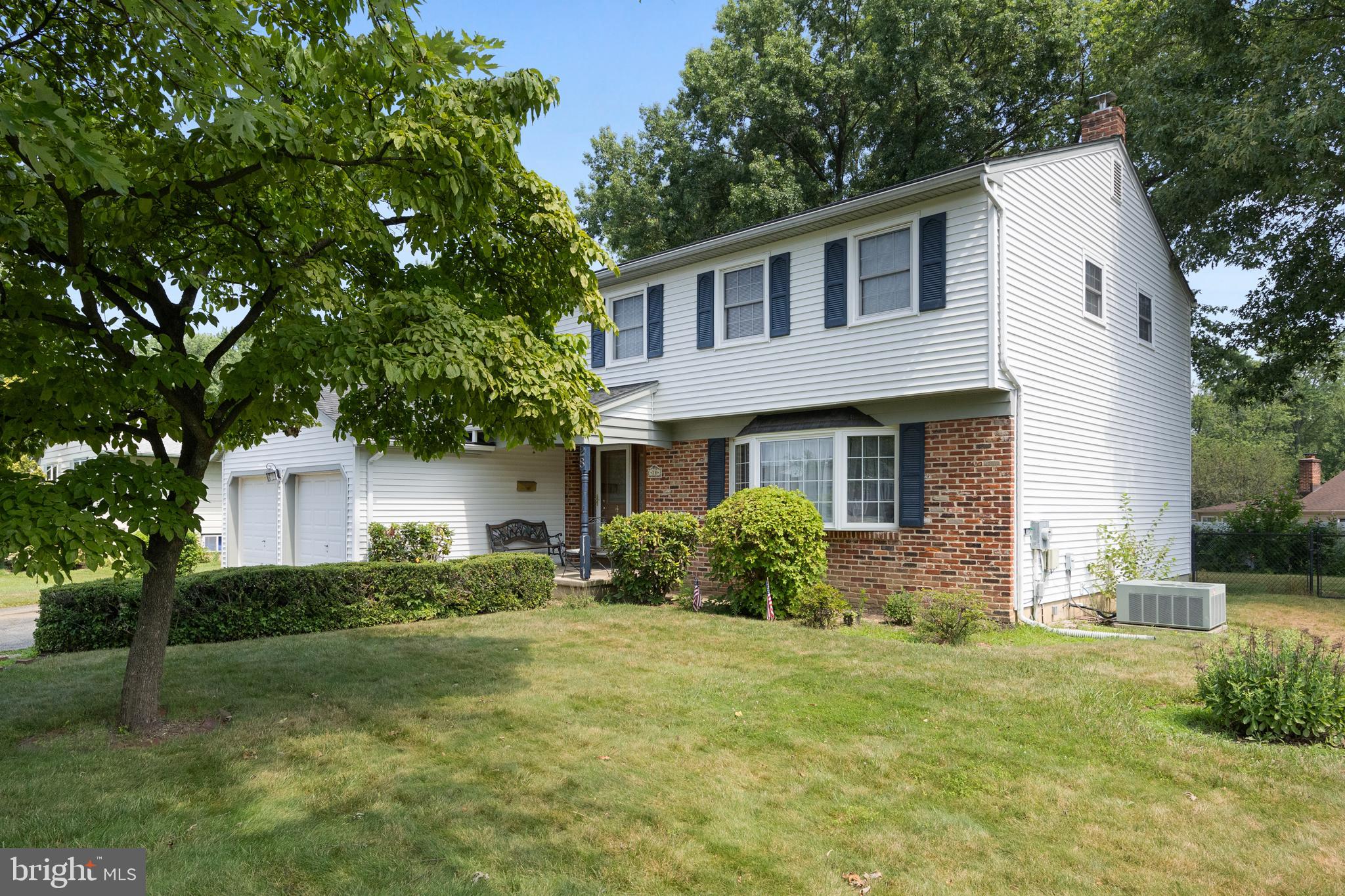 28 Elmgate Road Marlton, NJ 08053 - Photo 2 of 25 a front view of a house with a yard and trees