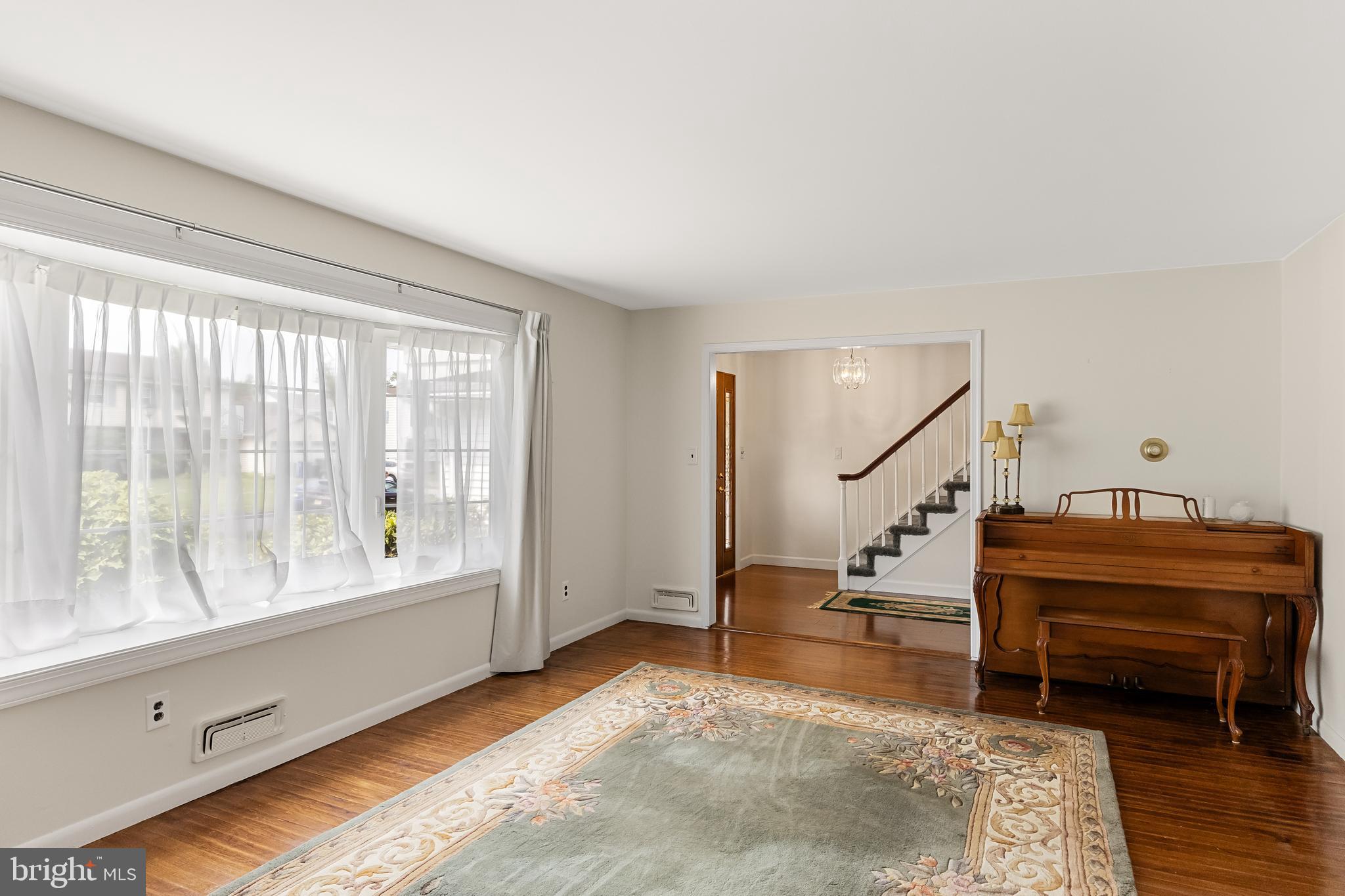28 Elmgate Road Marlton, NJ 08053 - Photo 5 of 25 a view of room with stairs and a rug