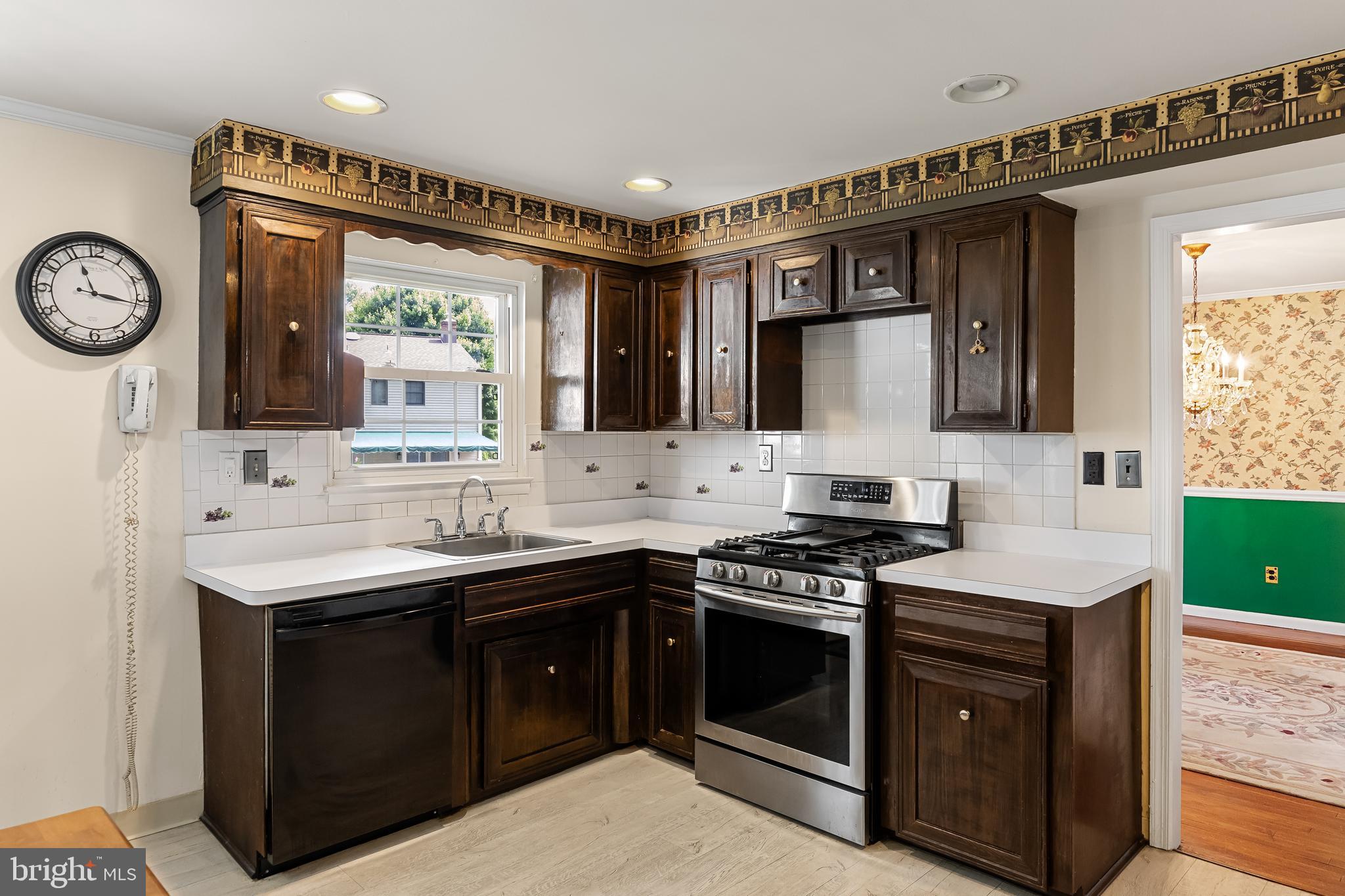 28 Elmgate Road Marlton, NJ 08053 - Photo 9 of 25 a kitchen with a sink stove and cabinets