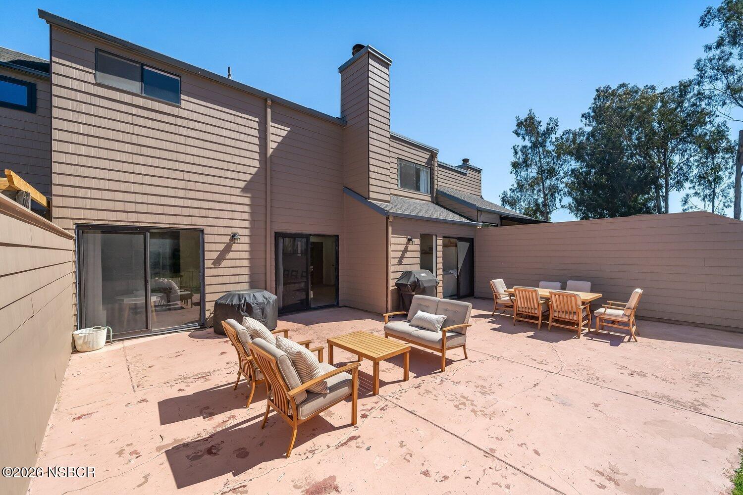 1496 Oakridge Park Road Santa Maria, CA 93455 - Photo 17 of 62 a view of backyard with outdoor seating and plants