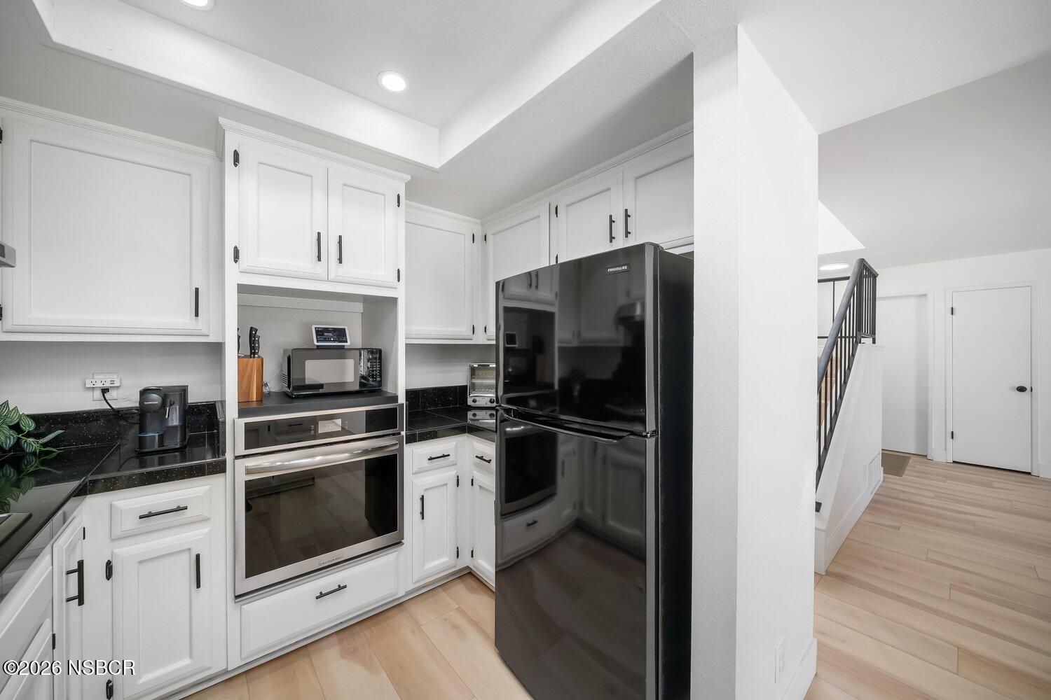 1496 Oakridge Park Road Santa Maria, CA 93455 - Photo 20 of 62 a kitchen with stainless steel appliances a refrigerator stove and sink