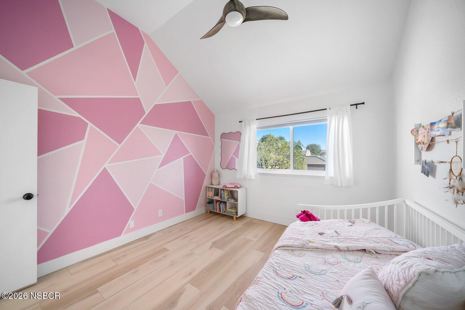 1496 Oakridge Park Road Santa Maria, CA 93455 - Photo 31 of 62 a bedroom with a bed and a window