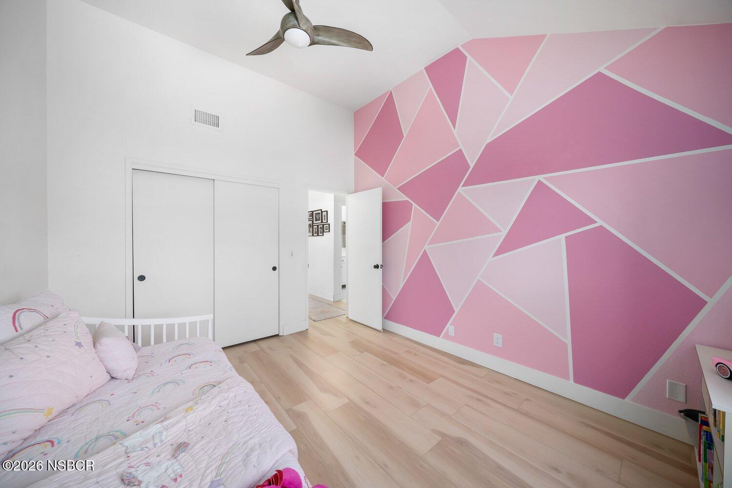 1496 Oakridge Park Road Santa Maria, CA 93455 - Photo 32 of 62 a bedroom with pink walls and pink rug