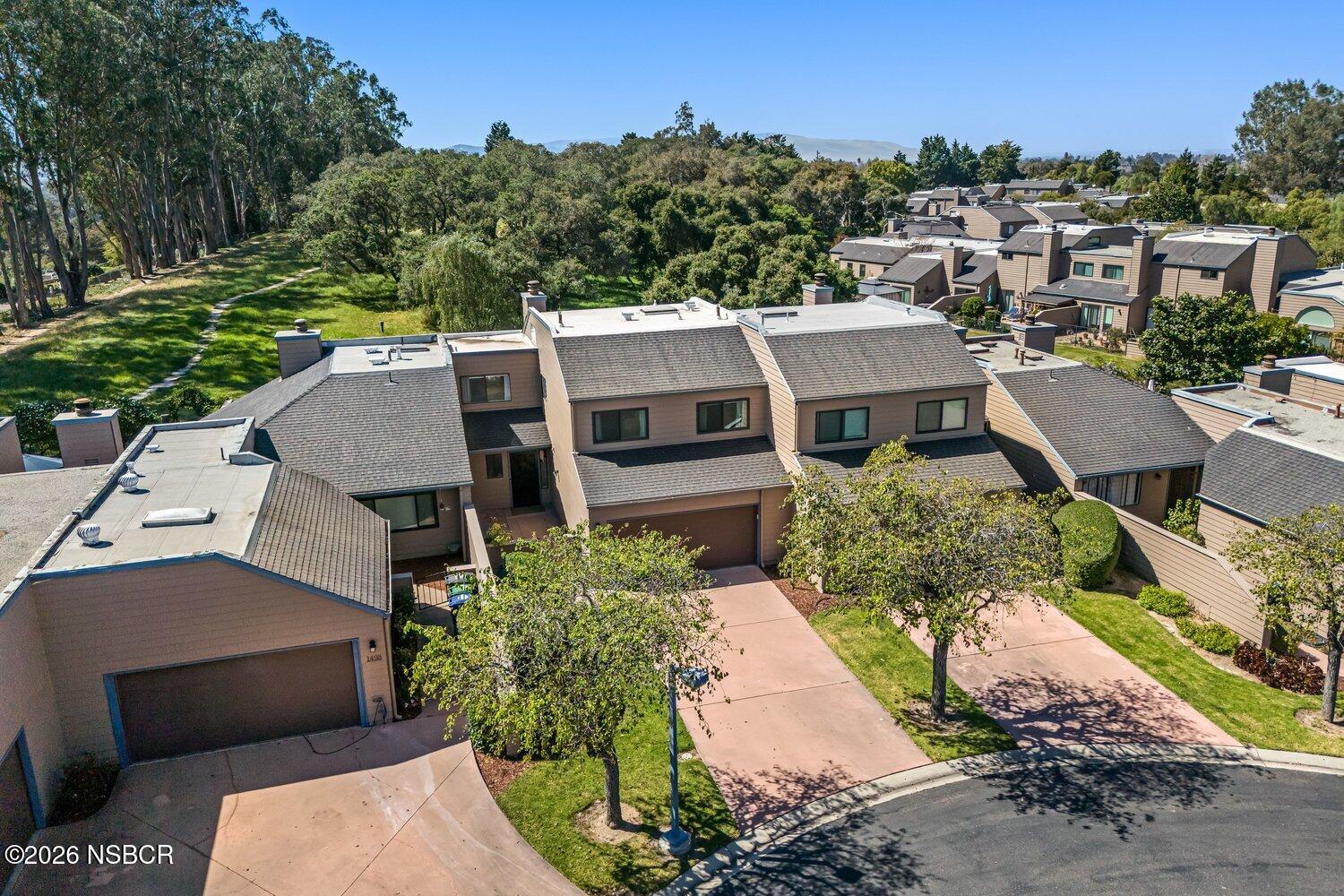 1496 Oakridge Park Road Santa Maria, CA 93455 - Photo 42 of 62 an aerial view of a house with a garden