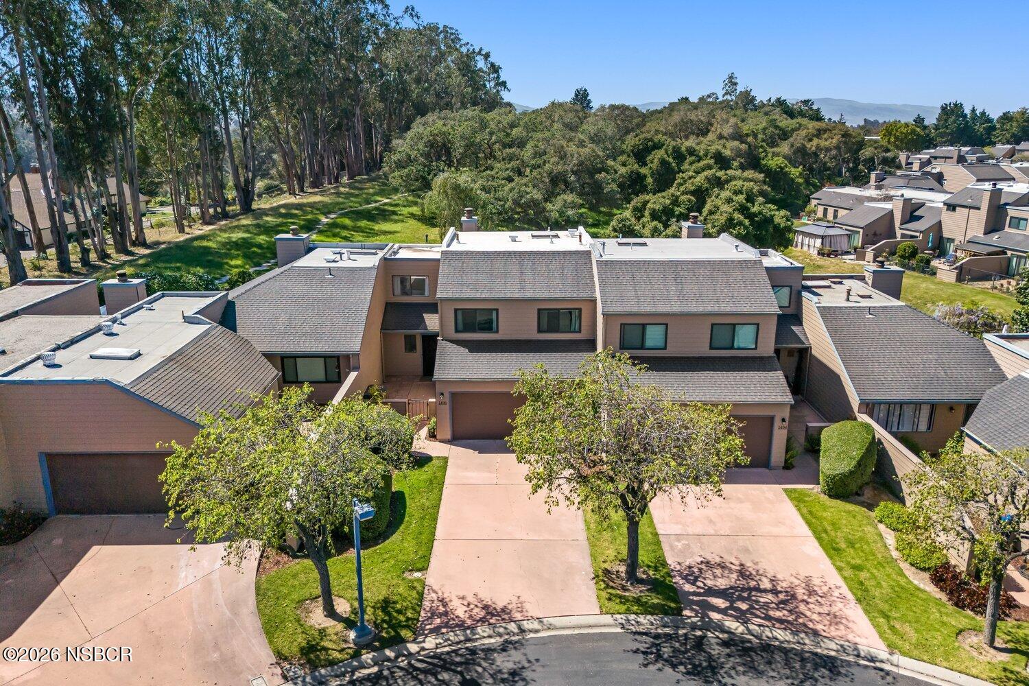 1496 Oakridge Park Road Santa Maria, CA 93455 - Photo 43 of 62 an aerial view of a house with a yard and large trees