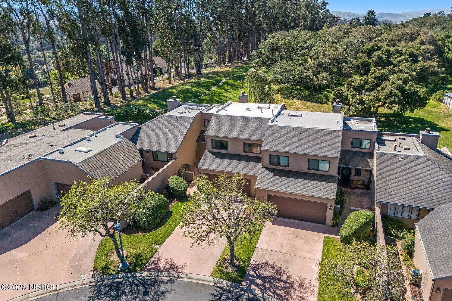 1496 Oakridge Park Road Santa Maria, CA 93455 - Photo 44 of 62 an aerial view of a house with garden space and a street view